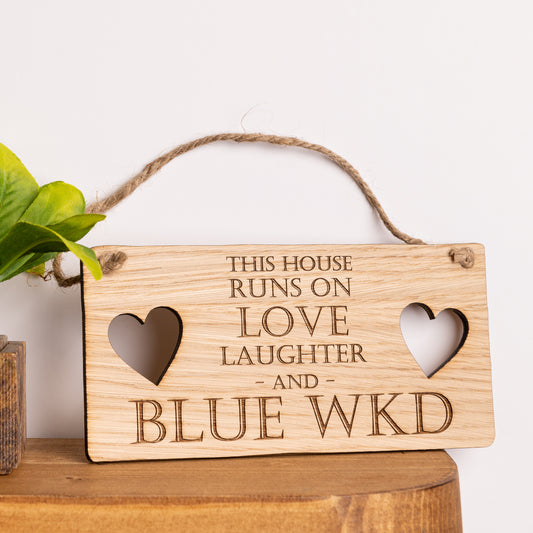 Blue WKD Hanging Sign - This House Runs On Love Laughter And BLUE WKD Plaque